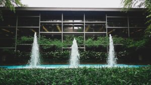 fountain and glass building