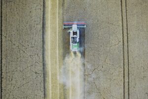 white tractor on gray field